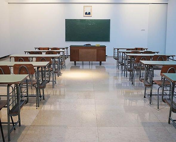 empty classroom with desks